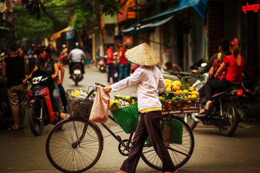 Cyclo ride in Hanoi cultural experience in Vietnam luxury tour