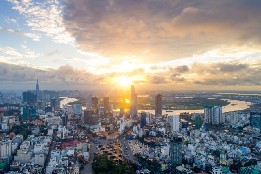 Luxury Trip to Vietnam panoramic skyline of Ho Chi Minh City at sunset