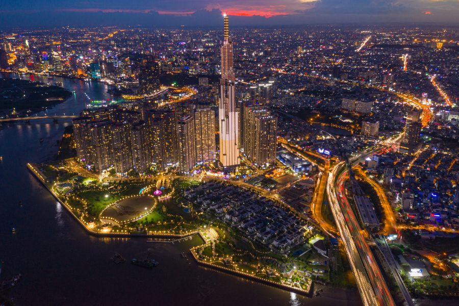 Luxury Vietnam Itinerary aerial night view of Ho Chi Minh City with Landmark 81 building