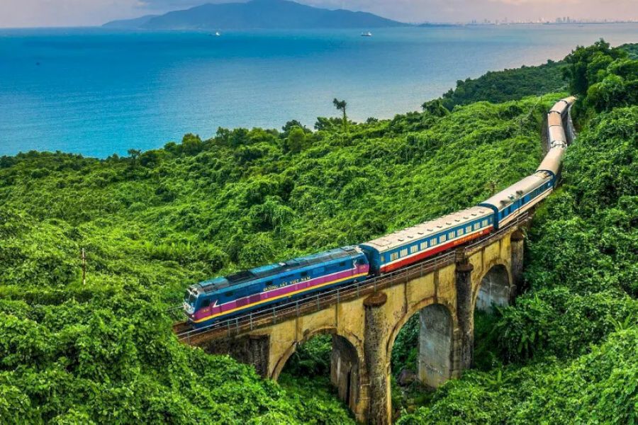 Luxury Vietnam Itinerary train journey along the central coast with sea and mountain views