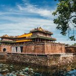 Luxury Vietnam tours Hue Imperial Citadel ancient architecture under blue sky