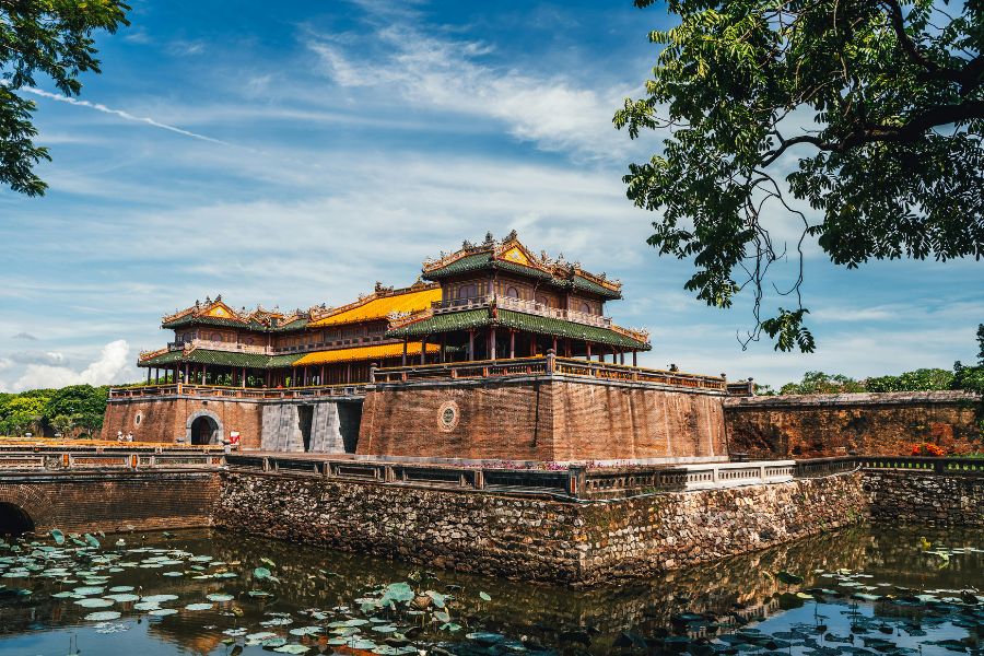 Luxury Vietnam tours Hue Imperial Citadel ancient architecture under blue sky