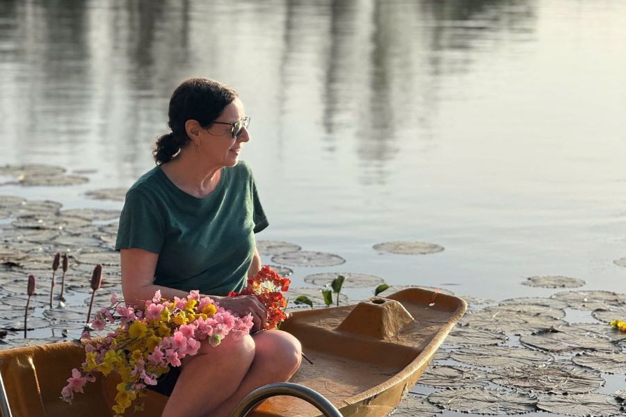 Mindful relaxation on a lotus pond, highlighting the serene beauty of Vietnam's floral heritage