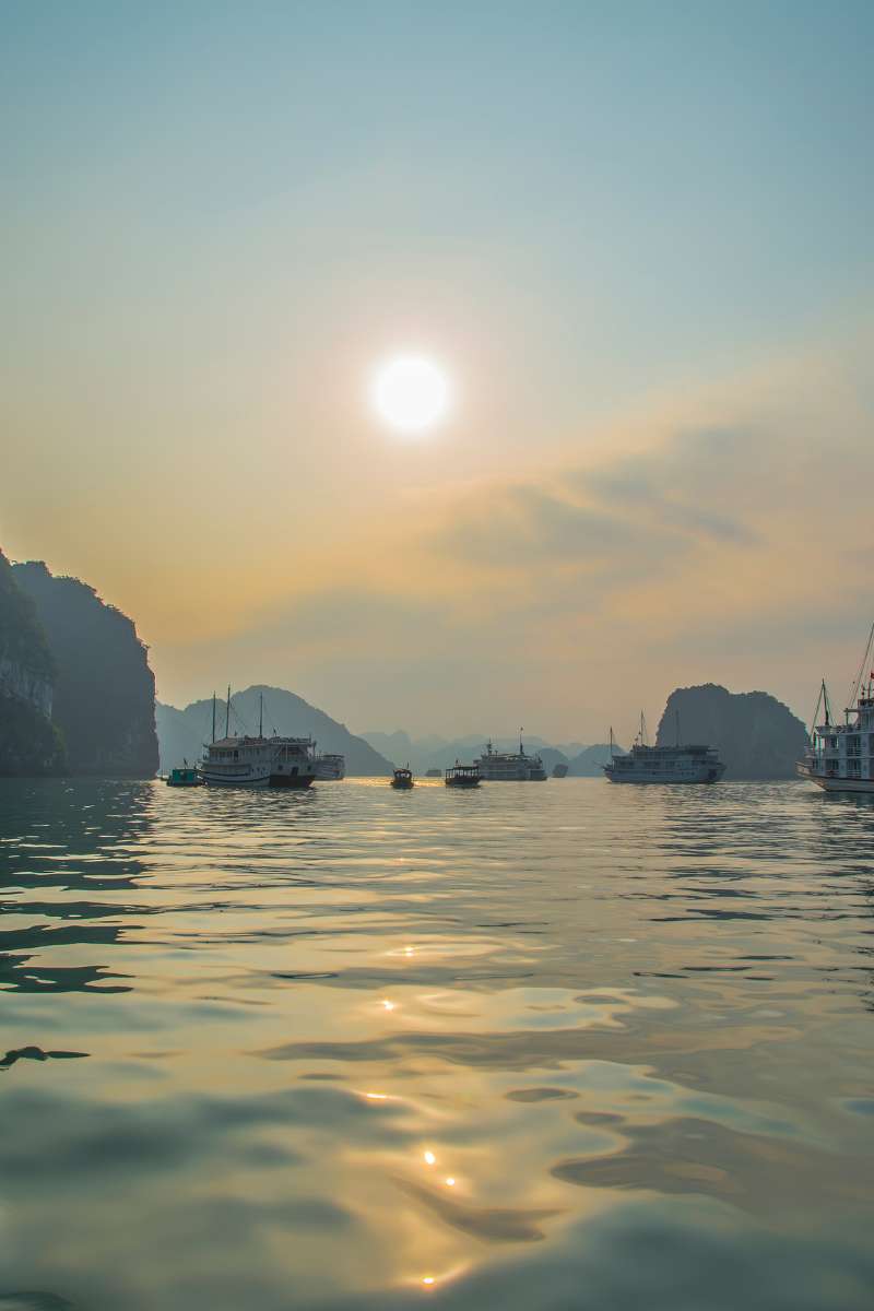 Sunset cruise view in Ha Long Bay vietnam luxury tours