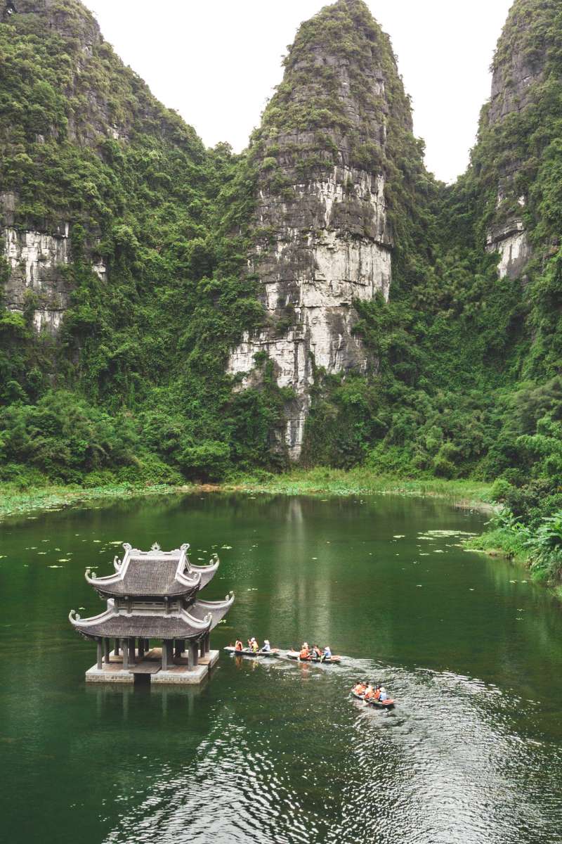 Temple on river in Ninh Binh Vietnam luxury tour