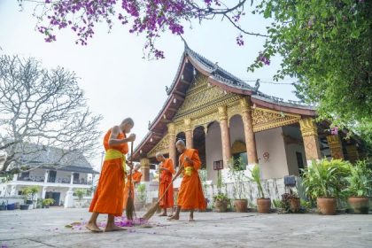 monks at luang prabang laos