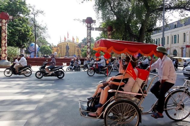 take a cyclo trip to visit hanoi old quarter