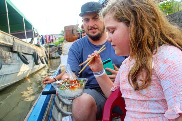 taste local specialty in family trip to mekong delta