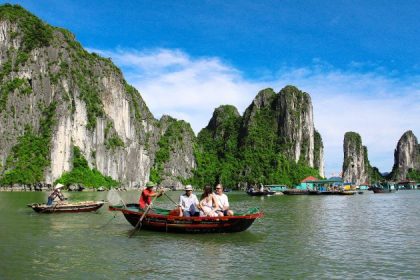visit halong bay on a rowing boat