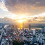 Luxury Trip to Vietnam panoramic skyline of Ho Chi Minh City at sunset